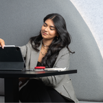 Commercial interior designer working on workspace concepts using digital design tools